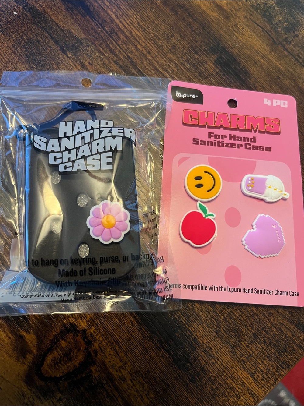 b.pure Black Silicone Hand Sanitizer Case with Pink Flower Charm